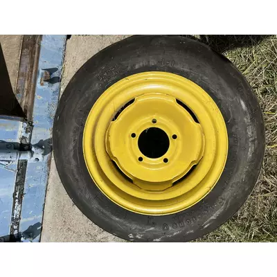 Колесо опорне з шиною JOHN DEERE AN241676 (диск 15*5 AN241669 (JD1384) на 5 шпильок+шина 3.9-15 Firestone)