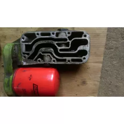корпус маслоохладителя RE39890 б/у JOHN DEERE RE39890